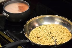 Boiling the liquid and toasting pine nuts_small