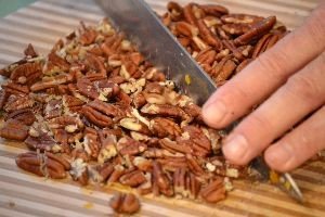chopping the already roasted walnuts_small