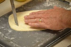 12 keep cutting out layers of puff pastry for coffin_small
