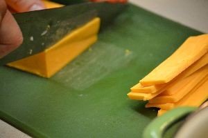 chop cheddar cheese into blocks_small