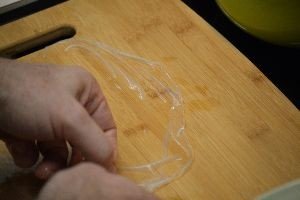 place on a cutting board that is a big wet so as not to stick to it_small