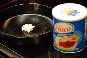 put a glob of Crisco in the skillet_small