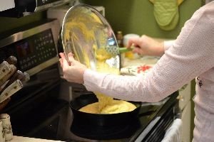putting the mixture into the hot skillet_small