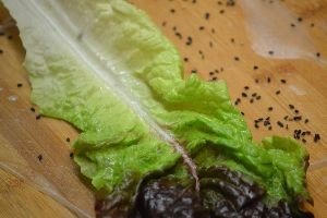 sprinkling black sesame seeds and adding some lettuce_small