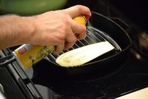 Gordon sprays the eggplant with cooking oil spray_small