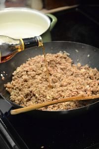 adding the marsala to the ground turkey and sausages_small