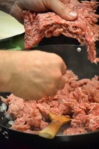 adding the spicy and sweet Italian sausages_small