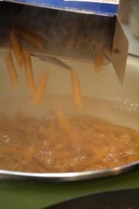 boiling some whole wheat pasta penne_small