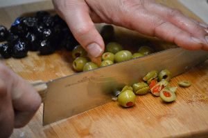 chopping the olives for the stuffed onions_small