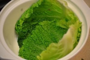 once you pat the cabbage dry you want to arrange the cabbage leaves into your casserole dish_small