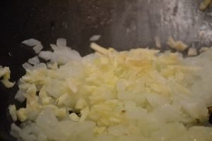 place the garlic into the wok for cooking_small