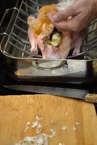 putting garlic inside the duck_small