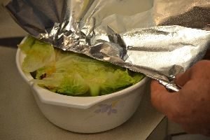 spray aluminum foil with olive oil and cover the timbale_small
