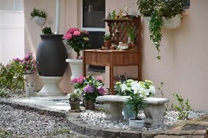 A The AFTER photo for our potting bench landscaping project_small