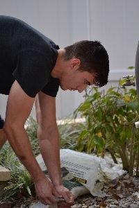 Brodie pouring the sand_small