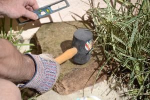 now start placing the stones along the little trench_small
