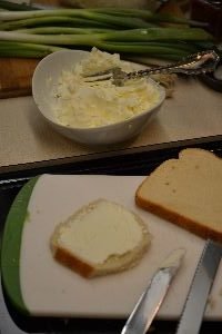 spreading the cream cheese onto the bread_small