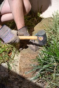 use a mallet and a level to make sure the blocks are even_small