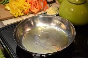 add olive oil to a pan_small