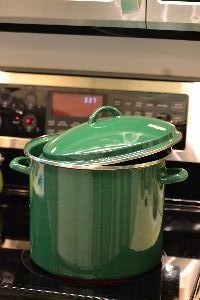 boiling a chicken on the stove top_small