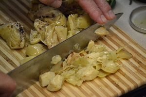 now chop the artichoke hearts into bite sized chunks_small