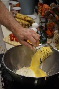 adding the dry ingredients to a bowl_small