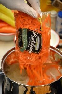 adding the already sliced carrots_small