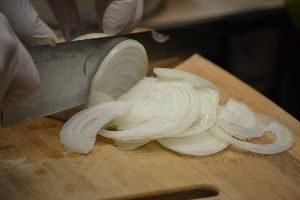 chopping our onion into half moons_small