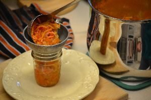 ladeling your relish into sterilized jars_small