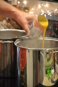 pouring-minute-maid-orange-juice-concentrate-into-batch_small