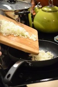 116 sauteeing onions in a pan_small