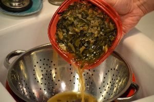 5 Drain your leftover collard greens into a collander_small