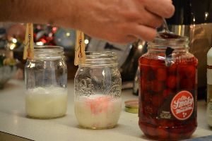 Moonshine adding liquid and cherries_small