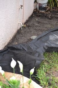Laying_the_weed_block._small
